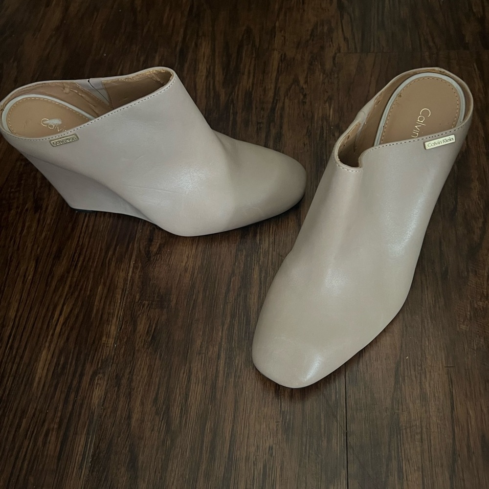Calvin Klein, leather mules, never worn.